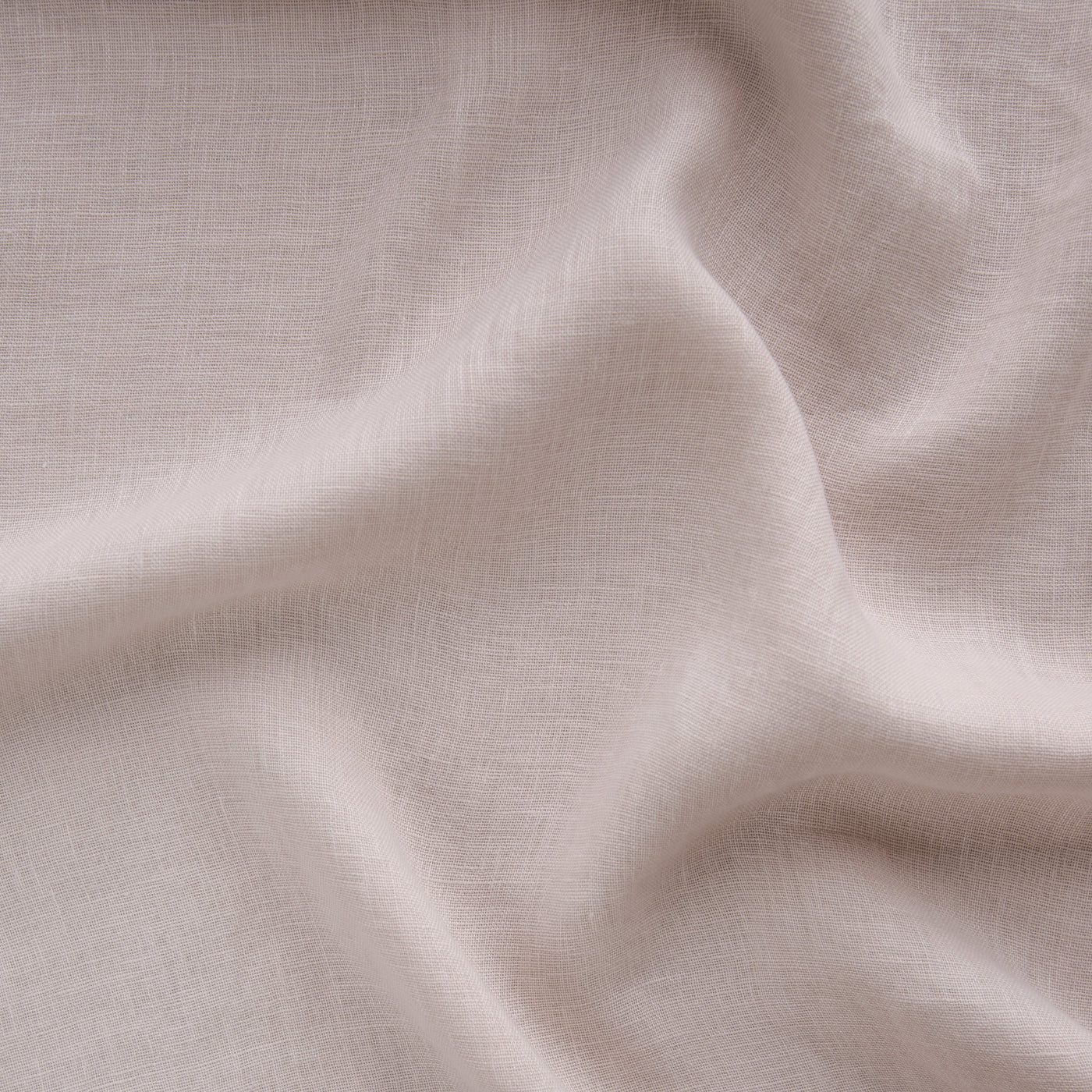 Soft drape of Pearl Linen Whisper fabric showing fine woven texture and gentle folds.