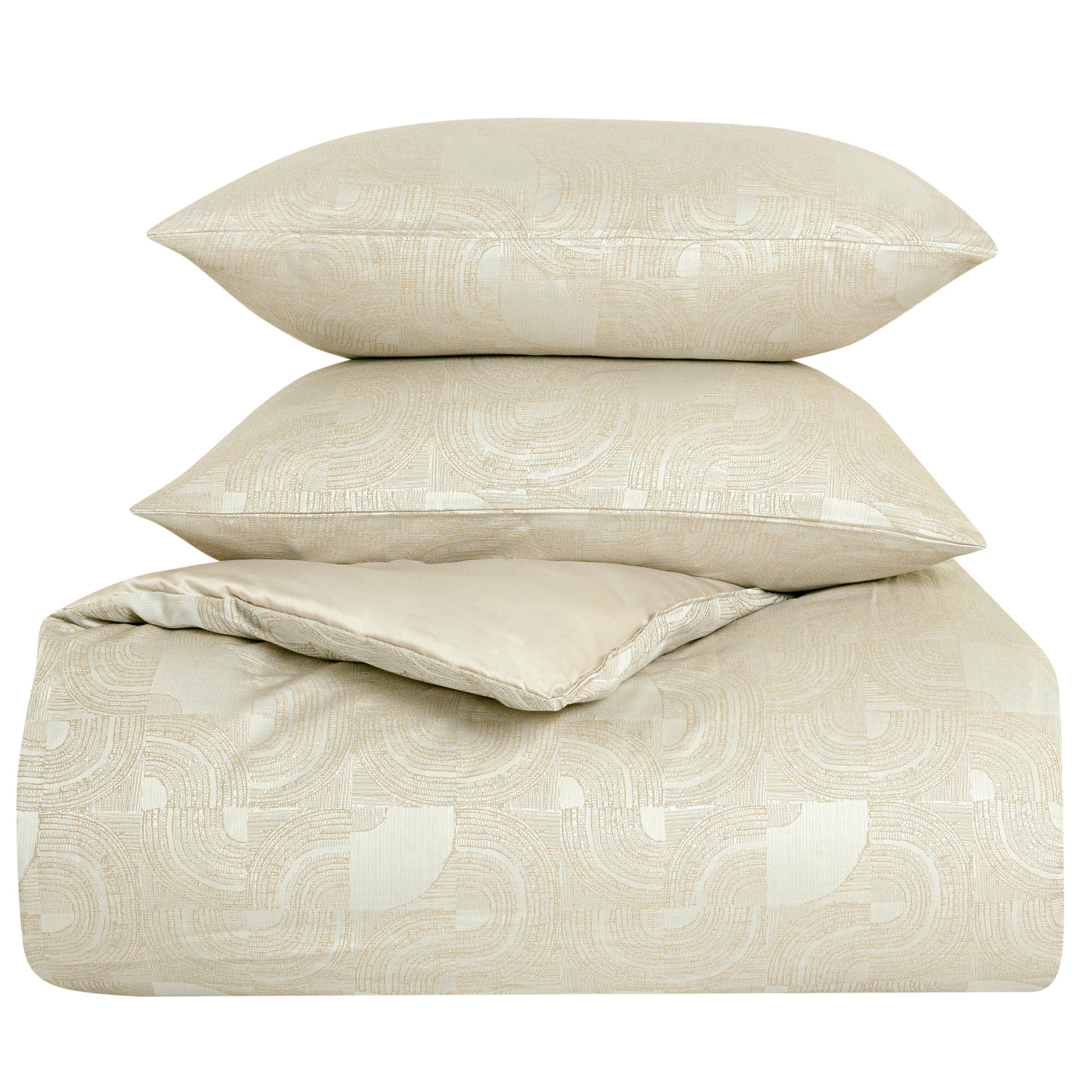 Ann Gish Lugano comforter set in ivory, stacked with two pillows showing swirl jacquard pattern.
