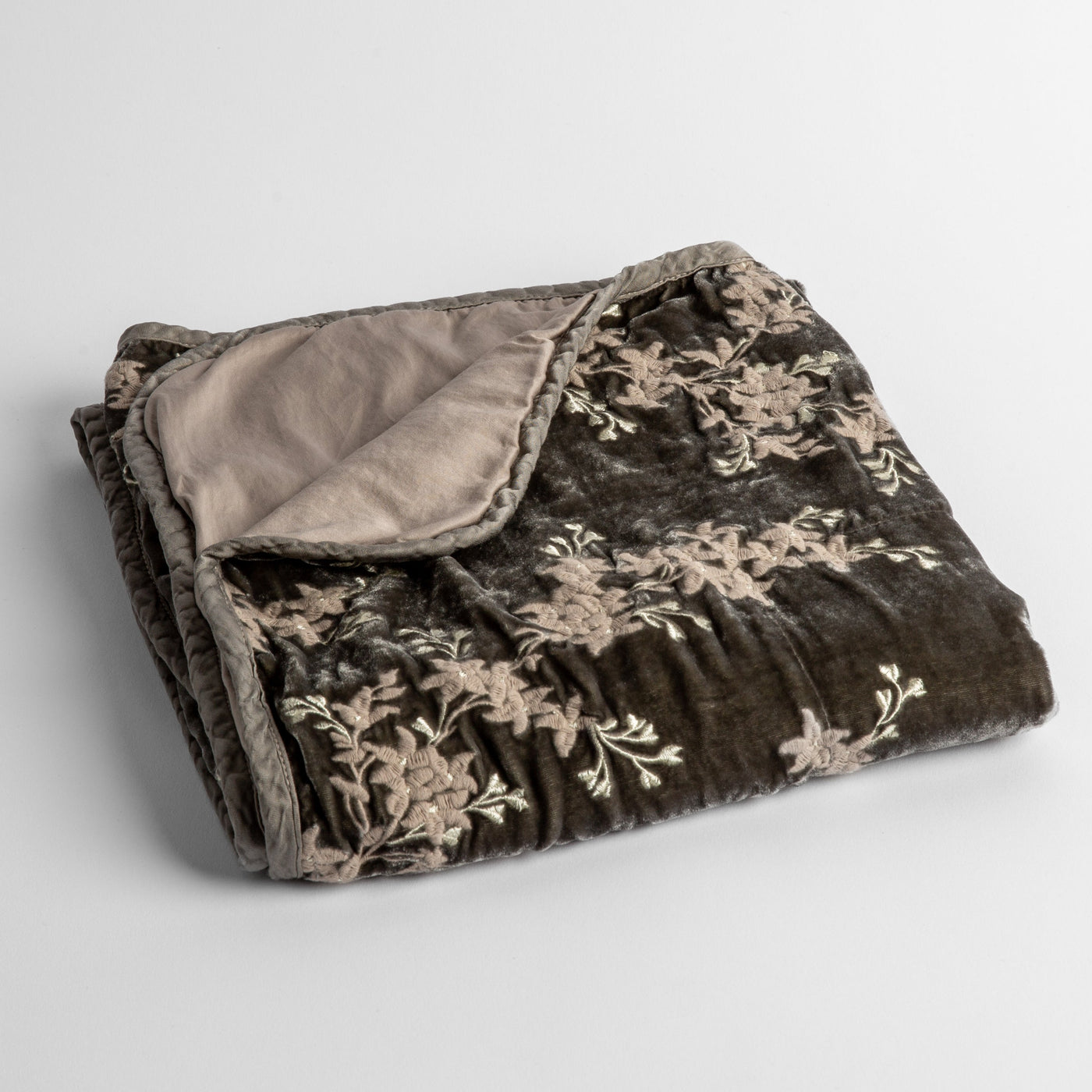 Bella Notte Lynette Baby Blanket in Fog, folded to show floral embroidery on velvet and plain reverse.
