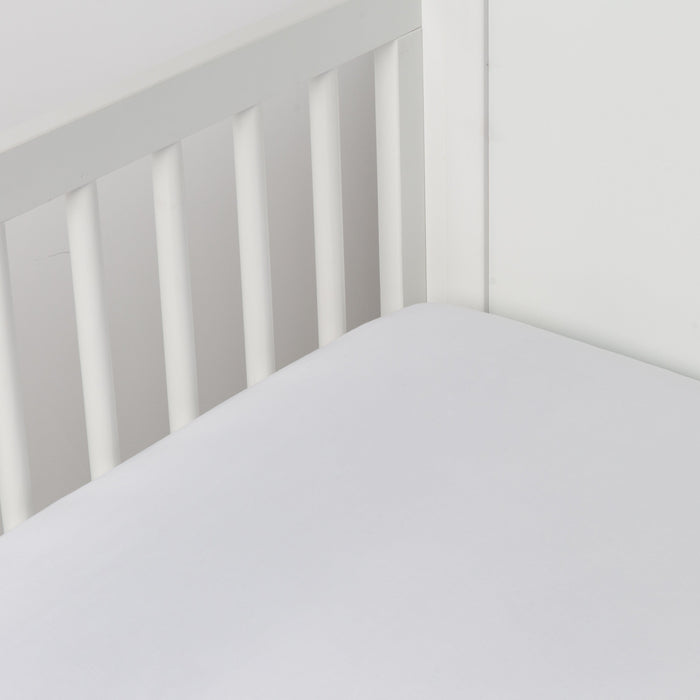 Photo of the Madera Luxe | Crib Sheet ensemble.