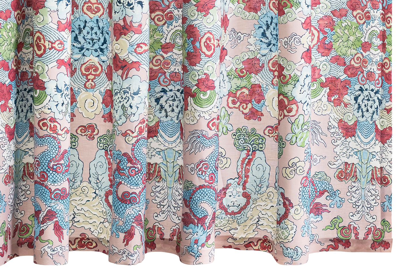 Colorful patterned fabric with dragons on a pink background