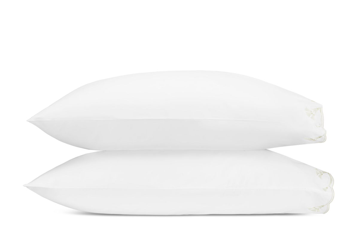 Two white Matouk Marcella pillowcases stacked, showing hemstitch detail at edge.