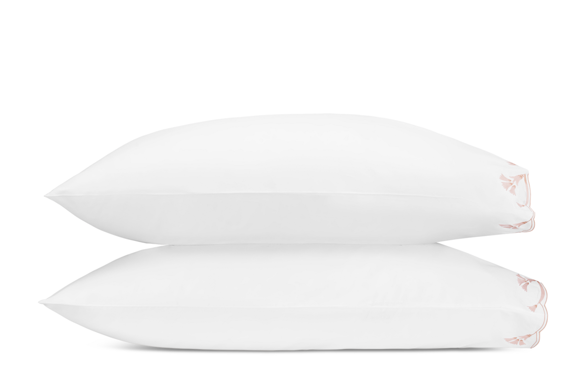 Matouk Marcella pillowcase pair in white with blush embroidered floral trim.