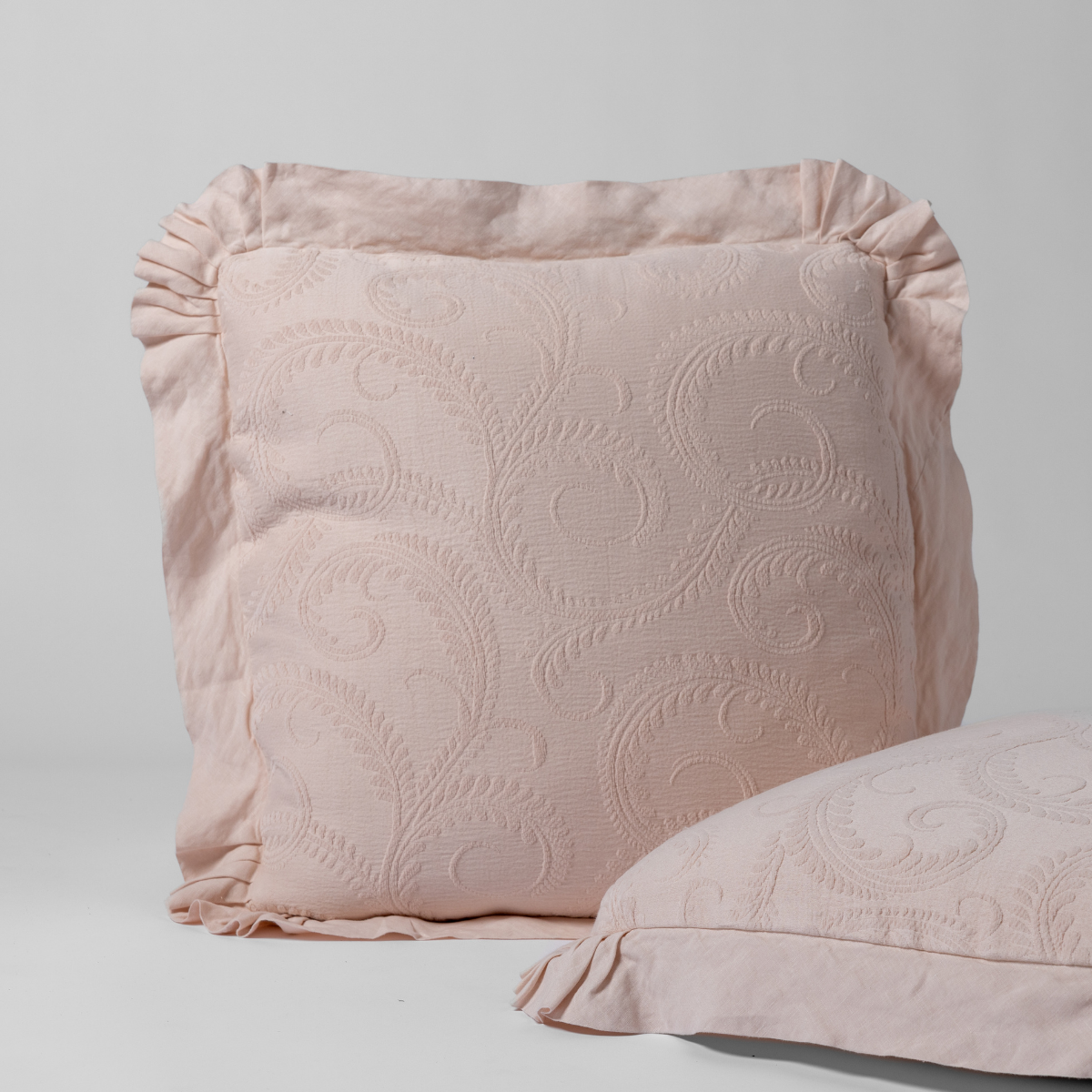 Bella Notte Marisette sham in Pearl with embossed paisley and ruffled edge detail.