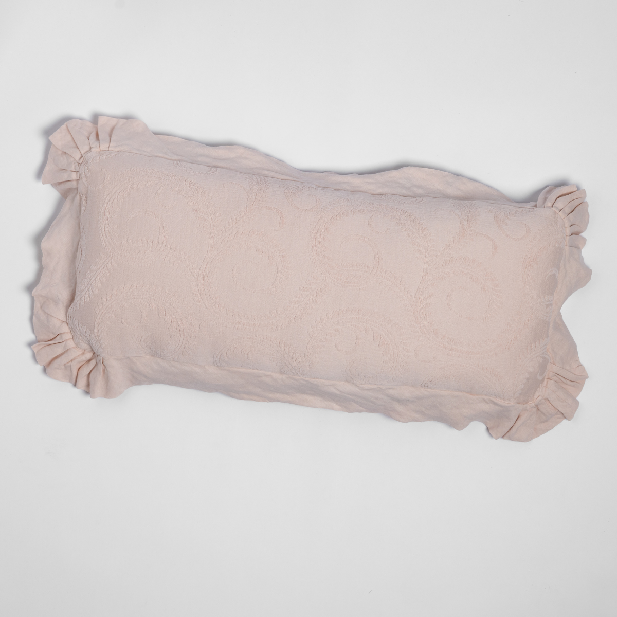 Pearl Bella Notte Marisette throw pillow with ruffled trim, flatlay on white background.
