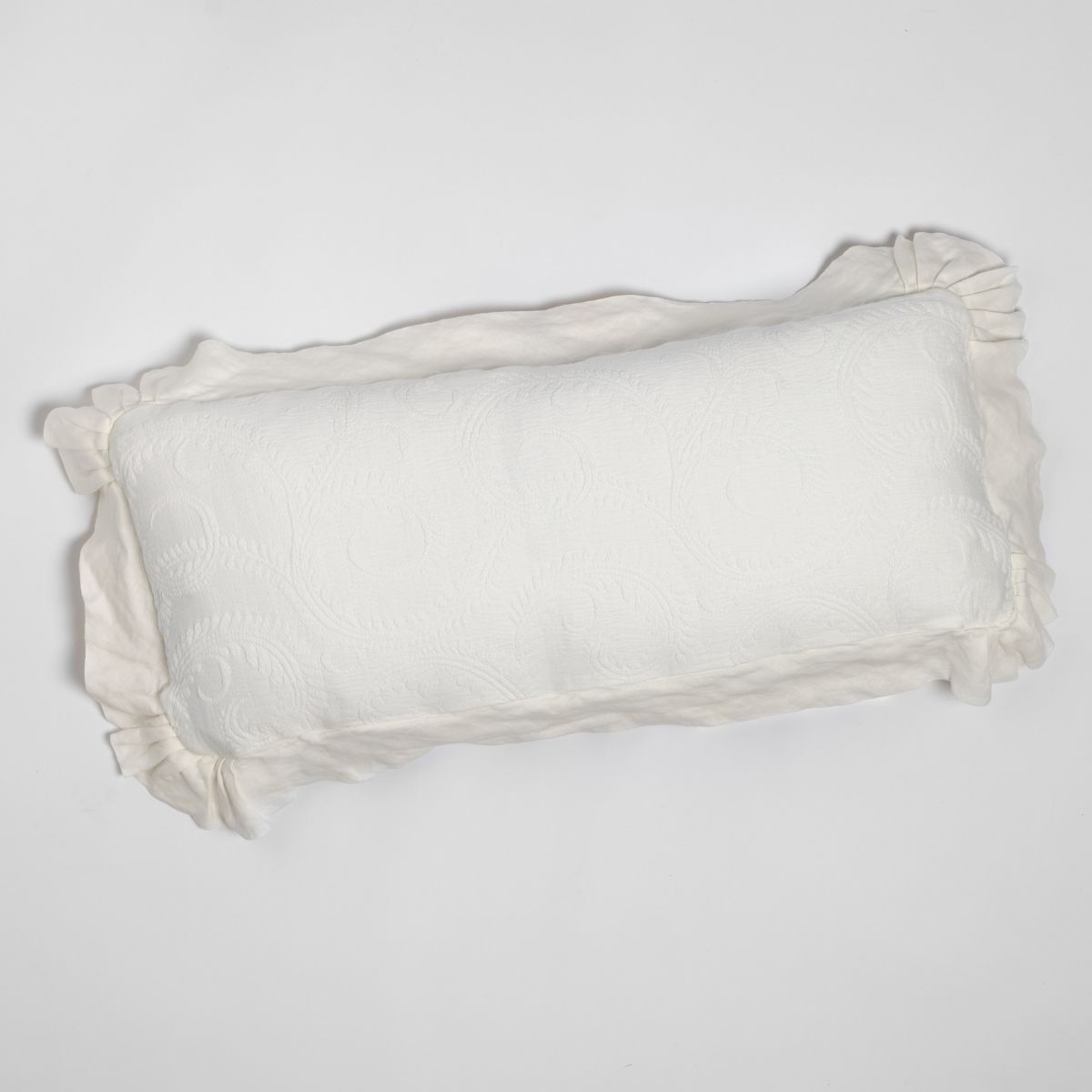 Bella Notte Marisette lumbar pillow, Winter White, ruffled edge detail on neutral background.