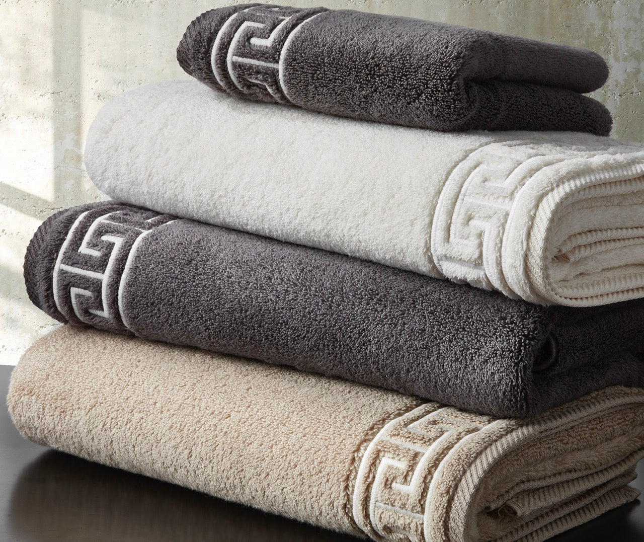 Image of stack of Matouk Adelphi bath towels