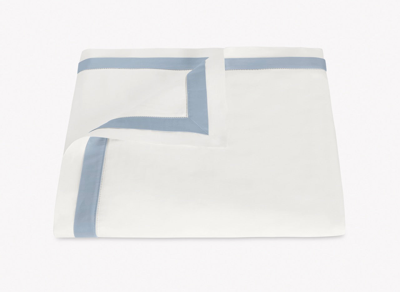 Image of Matouk Ambrose duvet in color bonehazy blue.