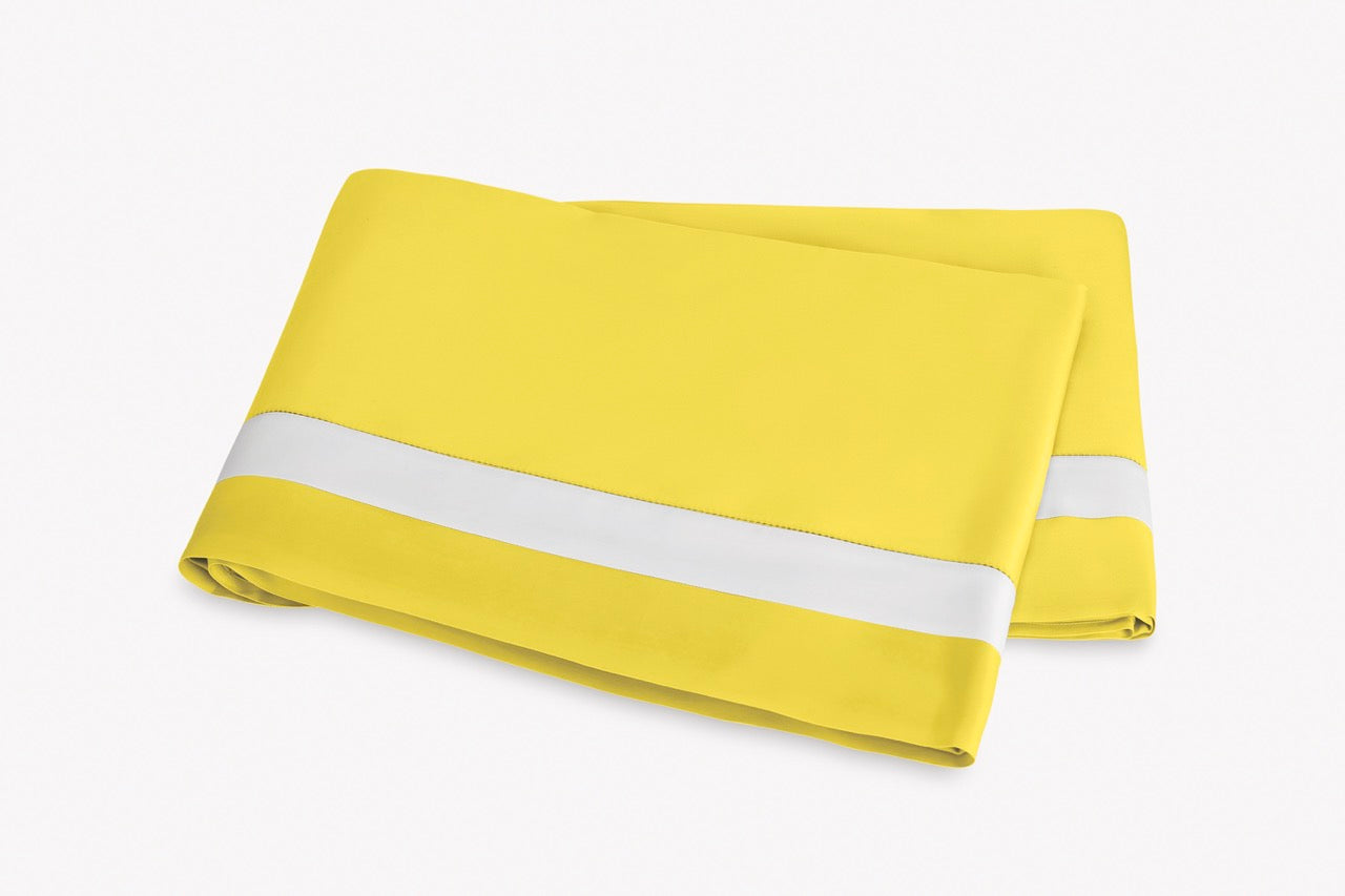 Image of Matouk Ambrose flat sheet in color lemon bone.