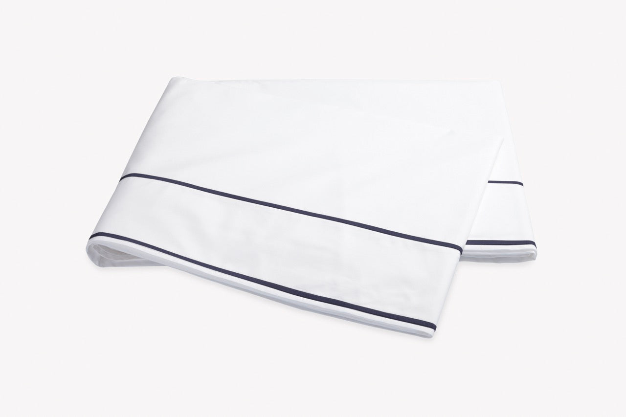 Image of Matouk Ansonia flat sheet in color navy.