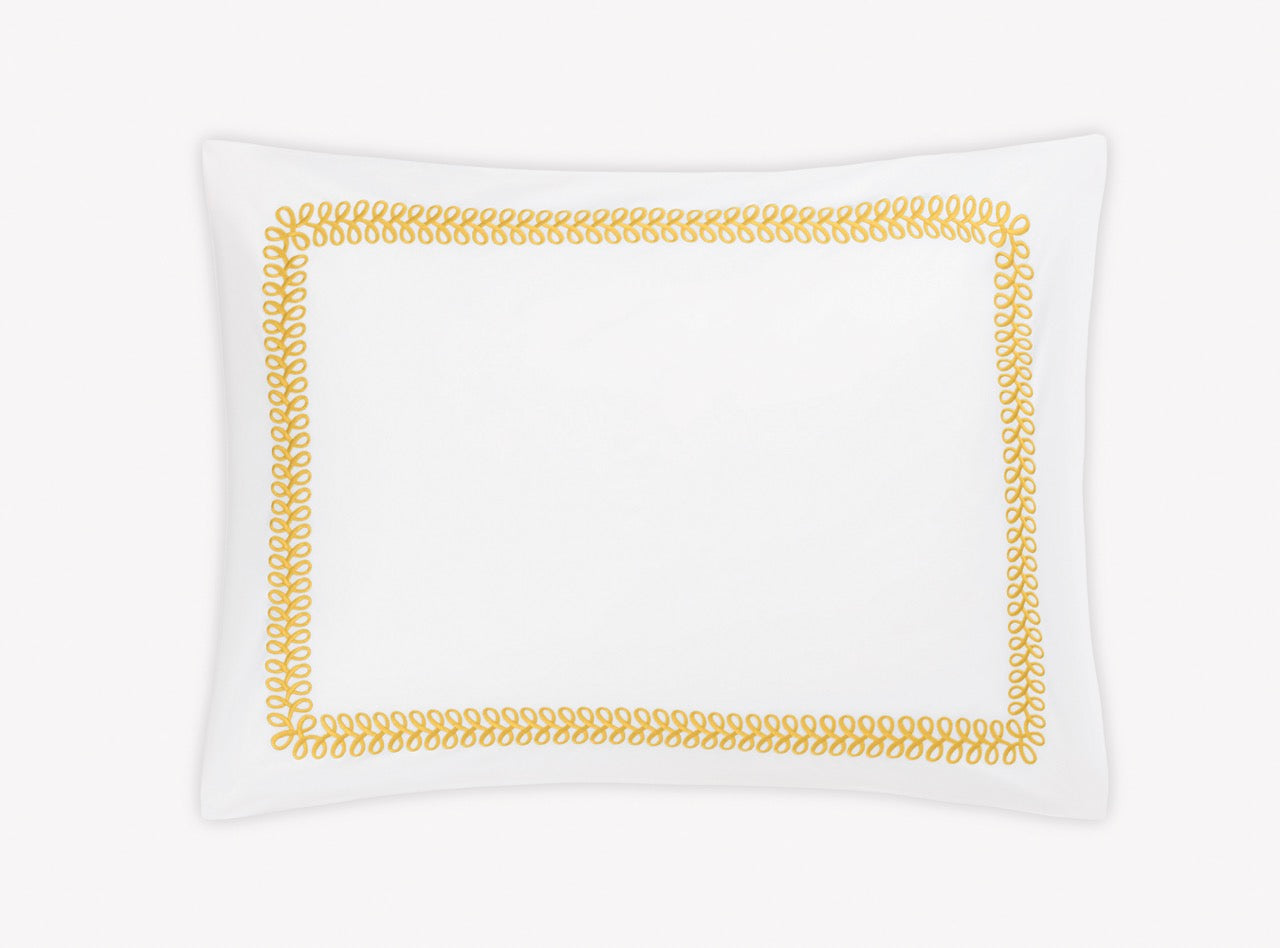 Image of Matouk Astor Braid sham in color lemon.