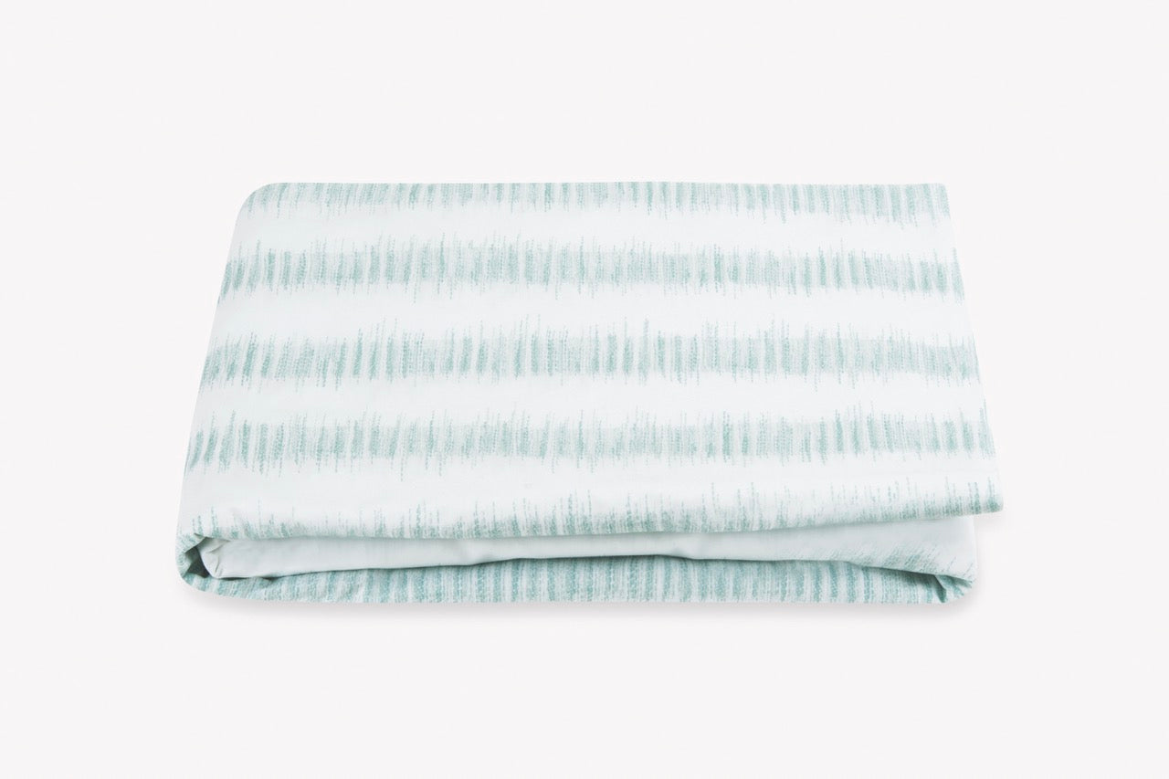 Image of Matouk Attleboro fitted sheet in color pool.