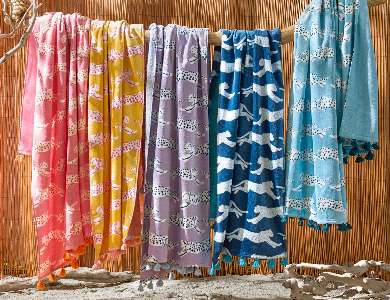 Image of Matouk Leaping Leopard Beach Towels