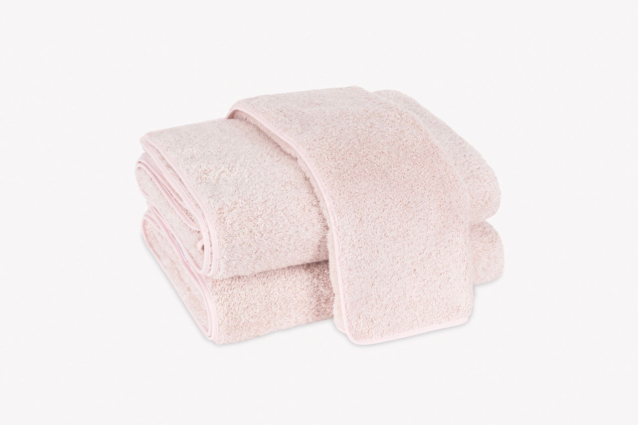 Image of Matouk Cairo towels in color blush.