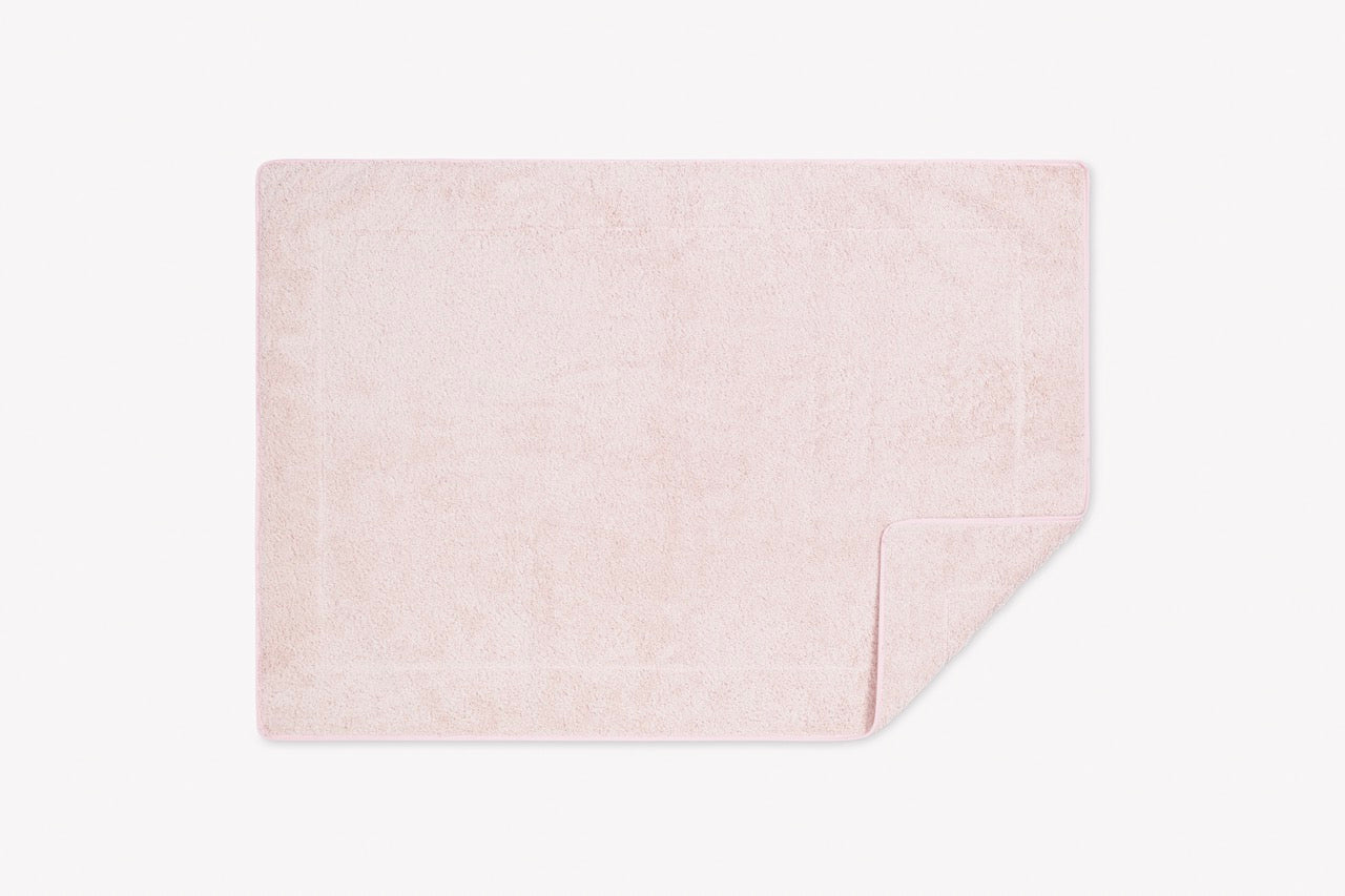 Image of Matouk Cairo straight tubmat in color blush.