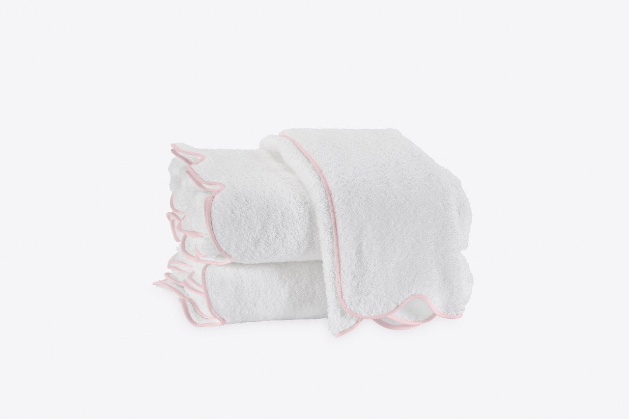 Image of Matouk Cairo towels in color Scallop pink.