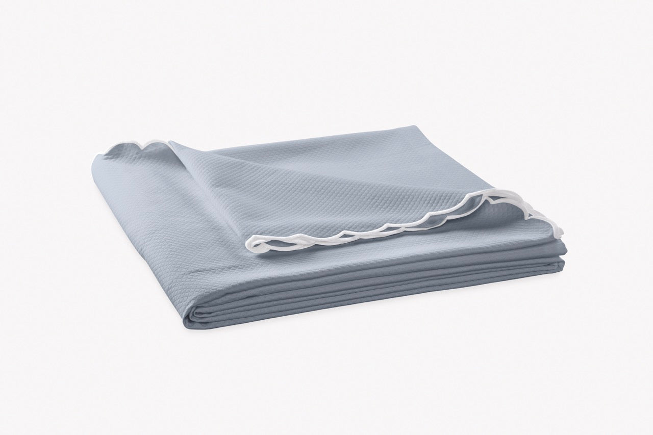 Image of Matouk Diamond pique coverlet in color hazy blue.