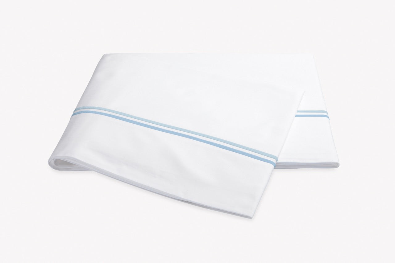 Image of Matouk Essex flat sheet in color light blue.