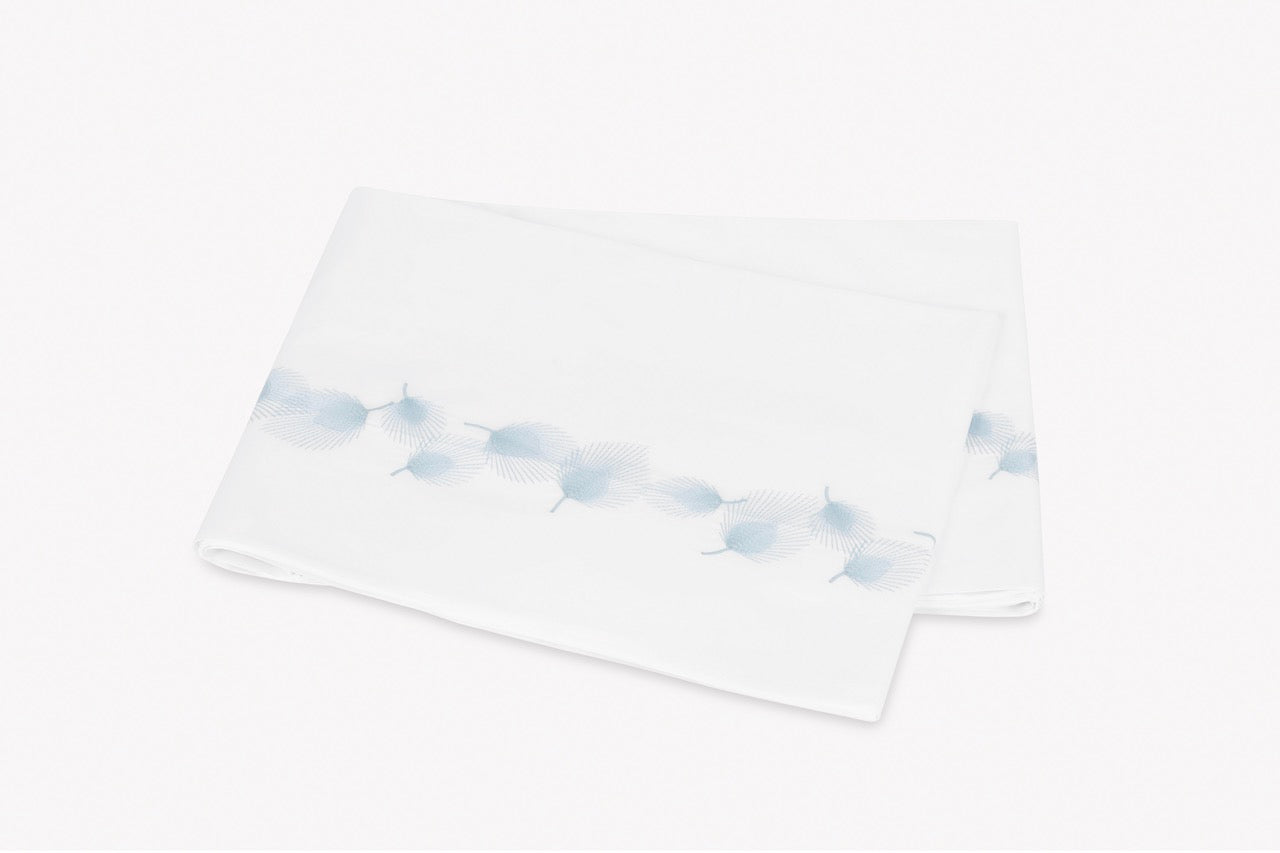 Image of Matouk Feather flat sheet in color blue.