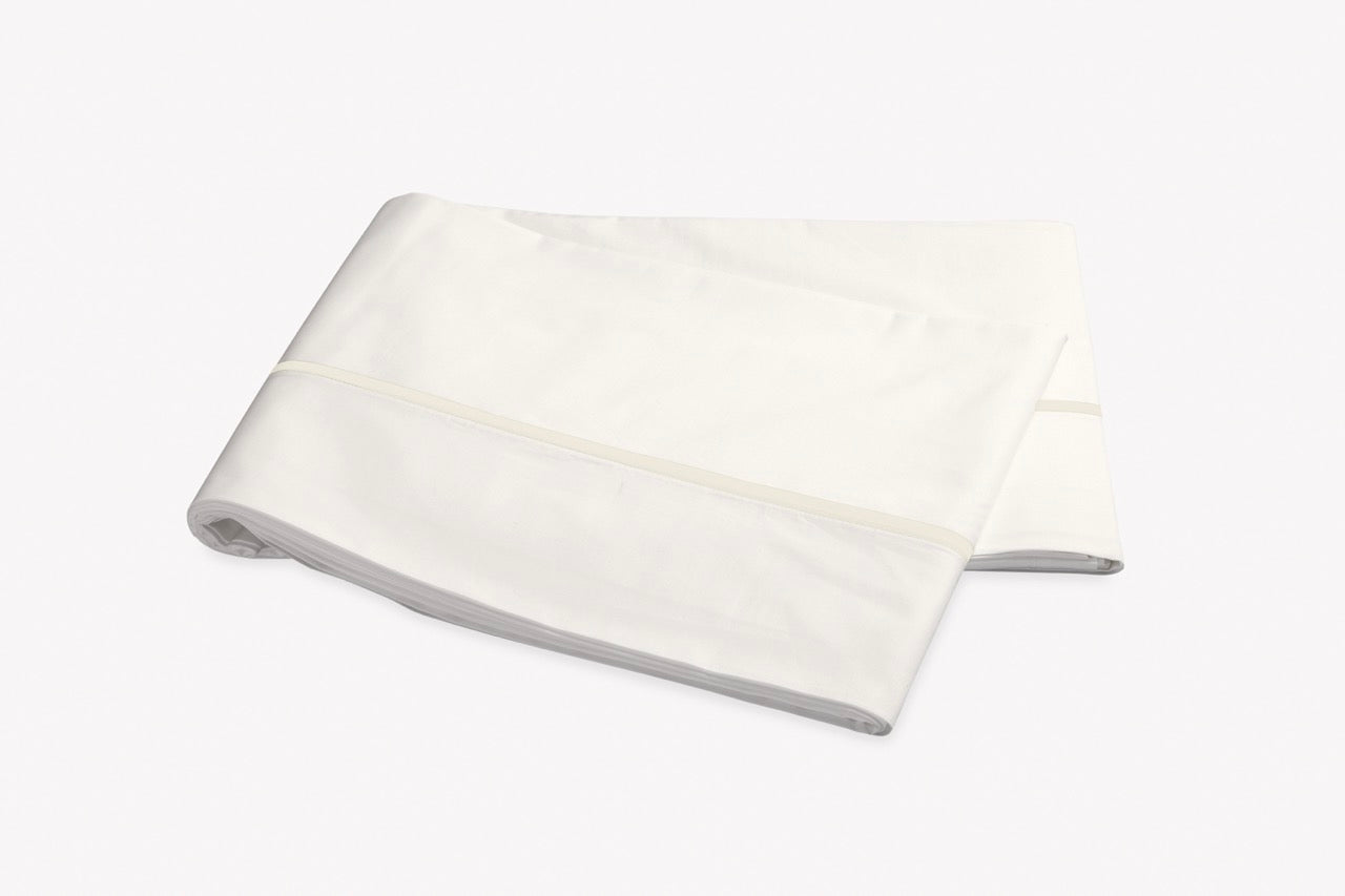 Image of Matouk Gatsby flat sheet in color ivory ivory.