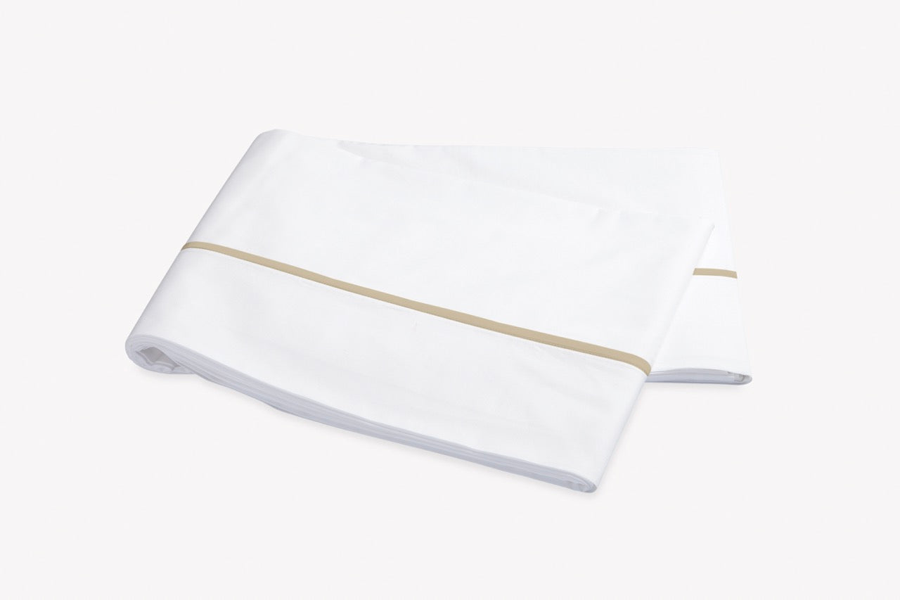 Image of Matouk Gatsby flat sheet in color champagne.