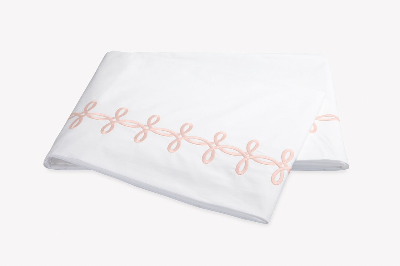 Image of Matouk Gordian Knot flat sheet in color blush.