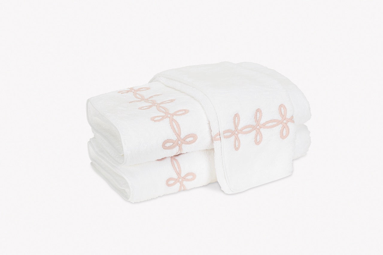 Image of Matouk Gordian Knot towels in color blush.