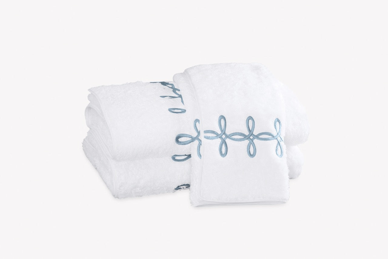 Image of Matouk Gordian Knot towels in color hazy blue.