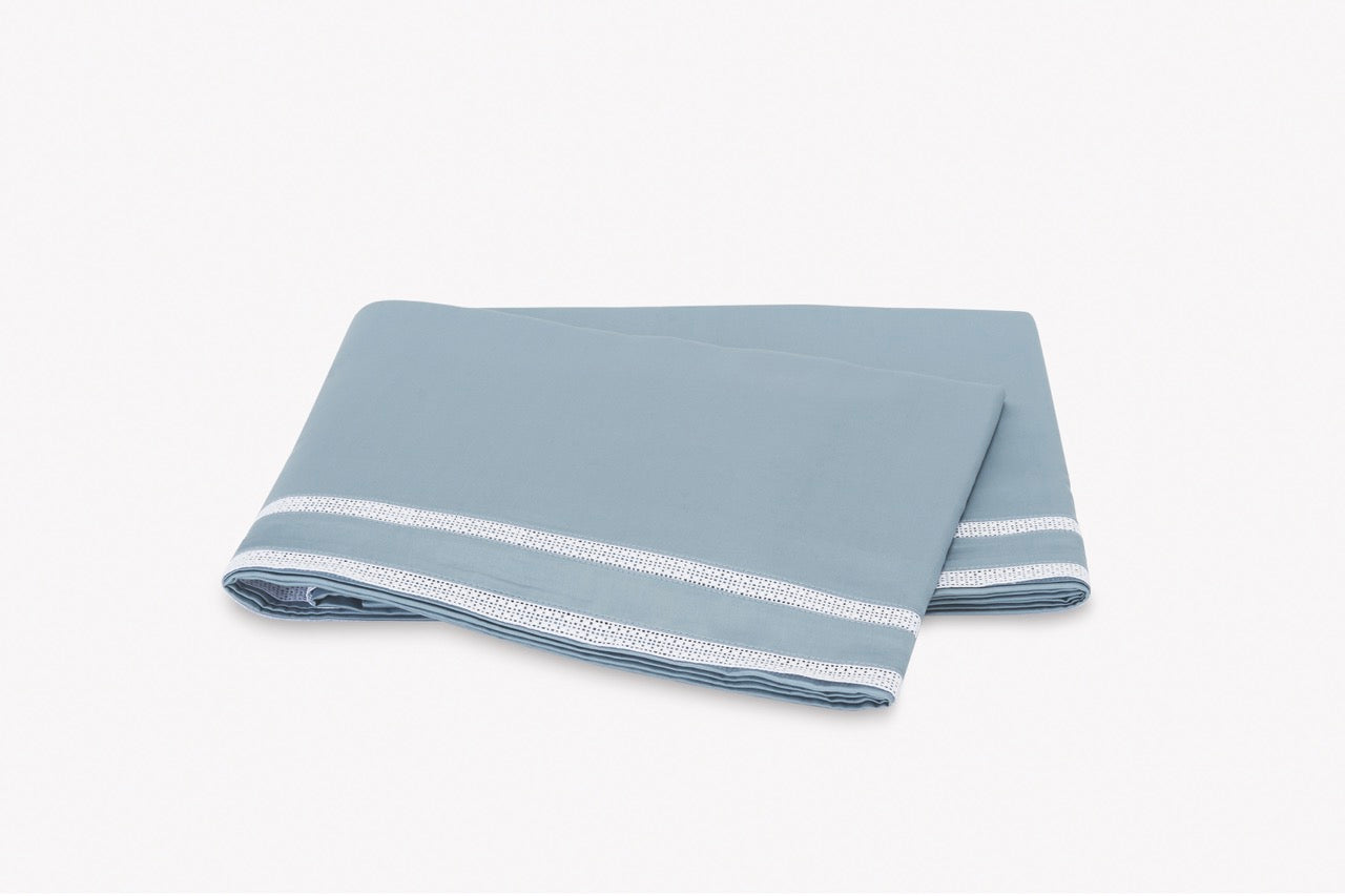 Image of Matouk Grace flat sheet in color hazy blue.