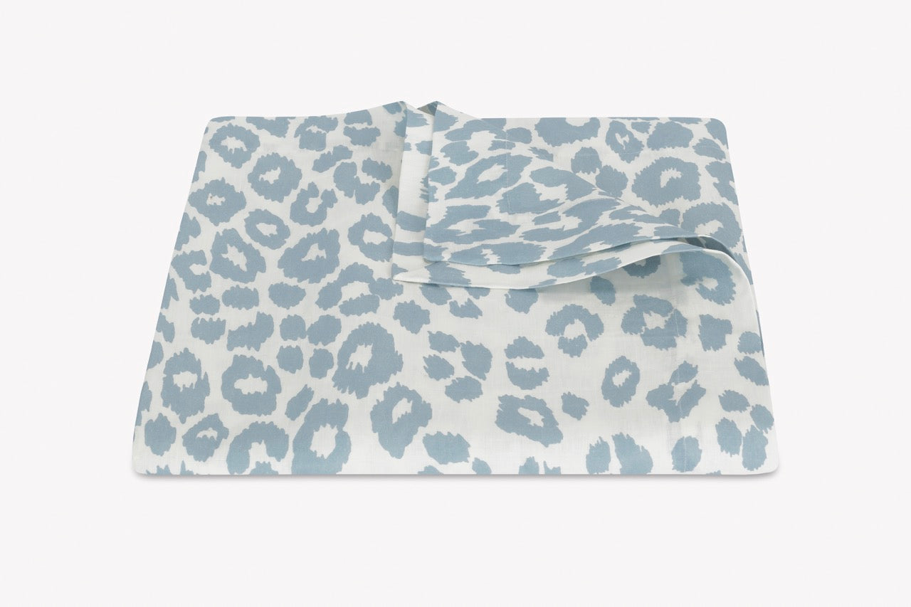 Image of Matouk Iconic Leopard tablecloth in color sky.