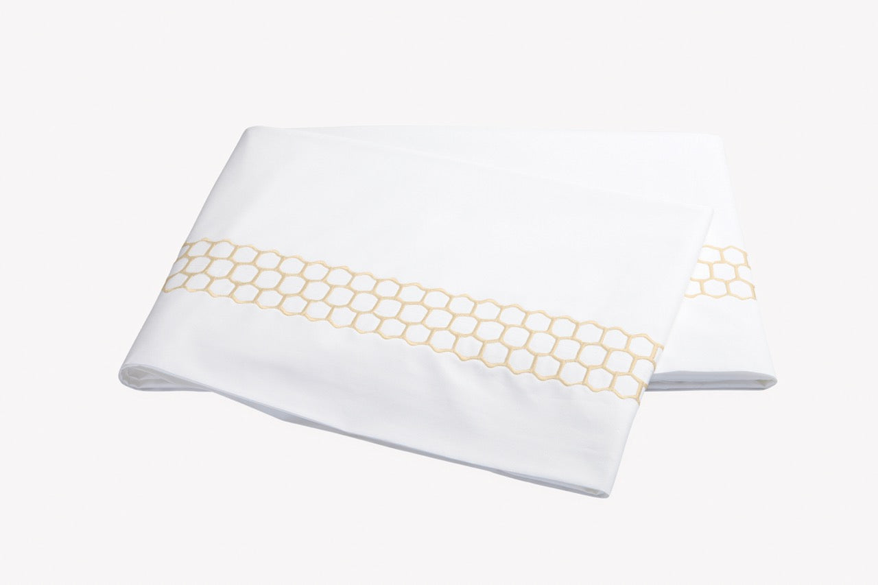 Image of Matouk Liana flat sheet in color champagne.