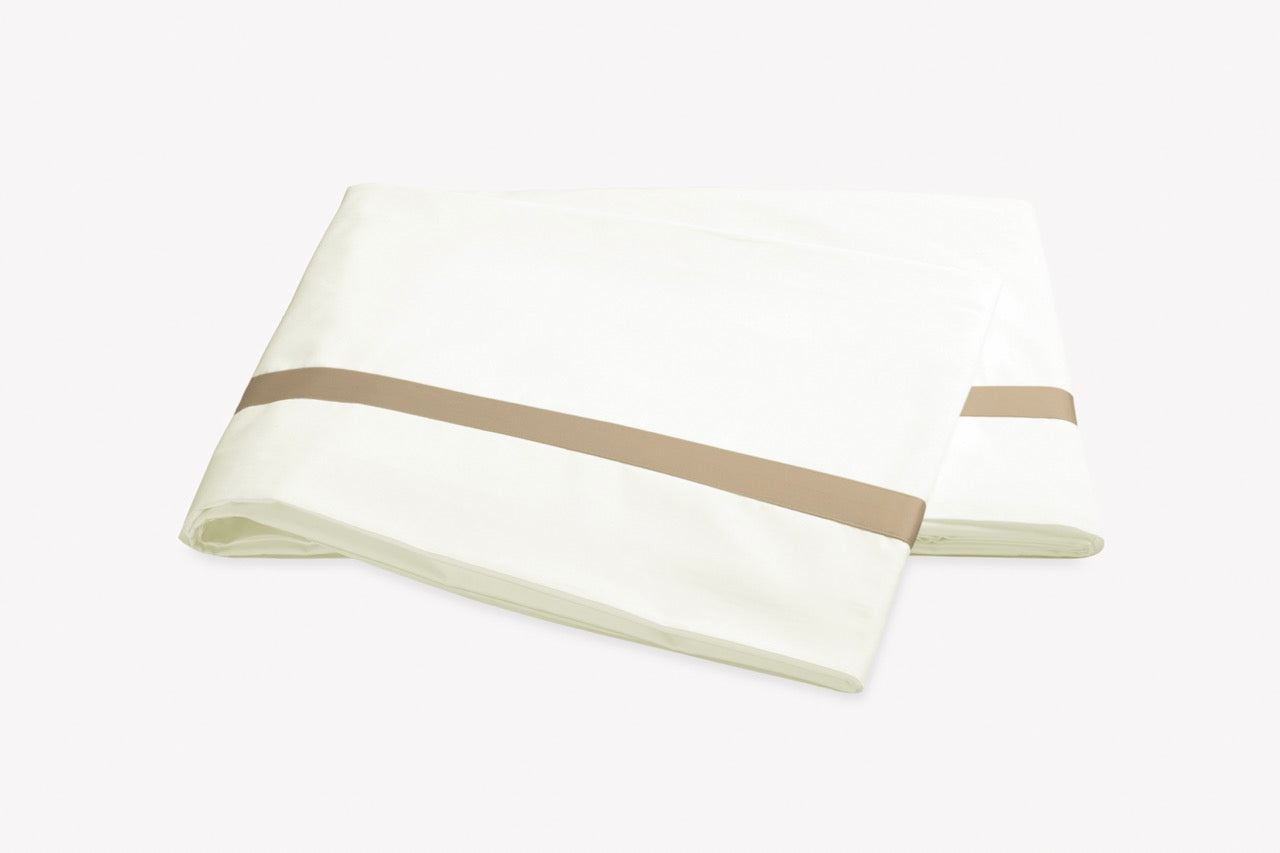 Image of Matouk Lowell flat sheet in color ivory champagne.