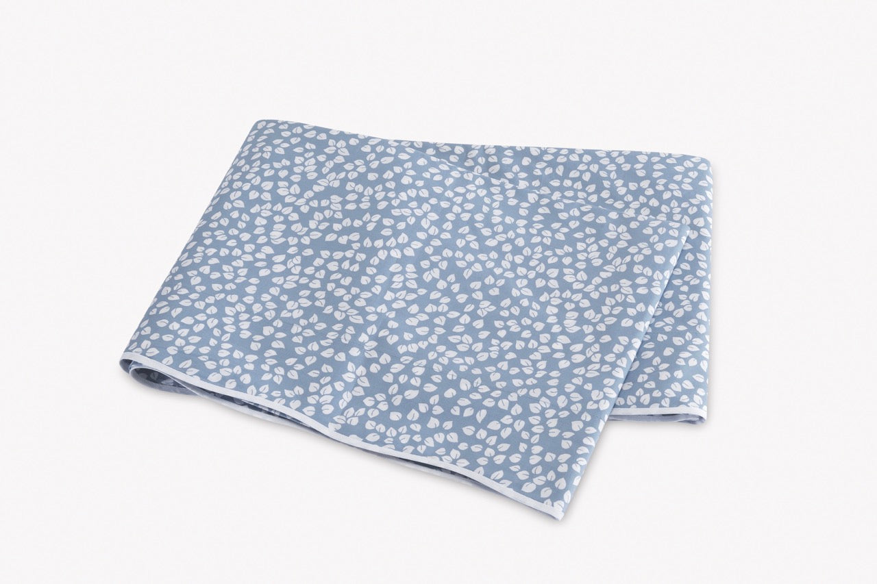 Image of Matouk Margot flat sheet in color hazy blue reverse.