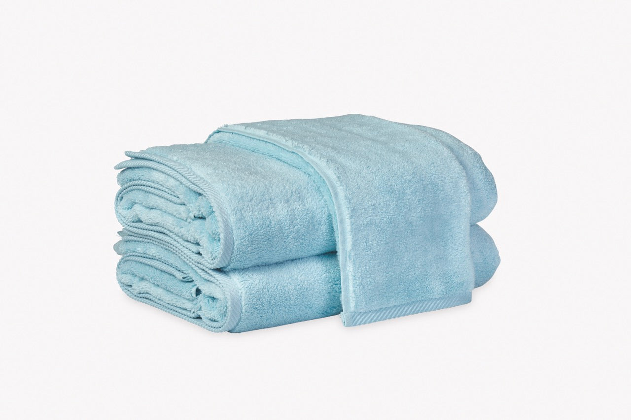 Image of Matouk Milagro towels in color Arctic blue.