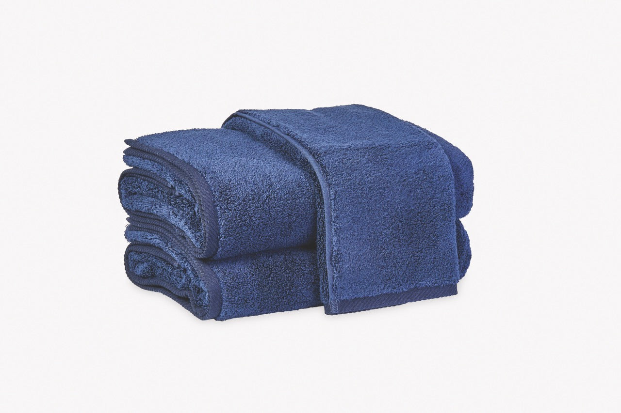 Image of Matouk Milagro towels in color navy.