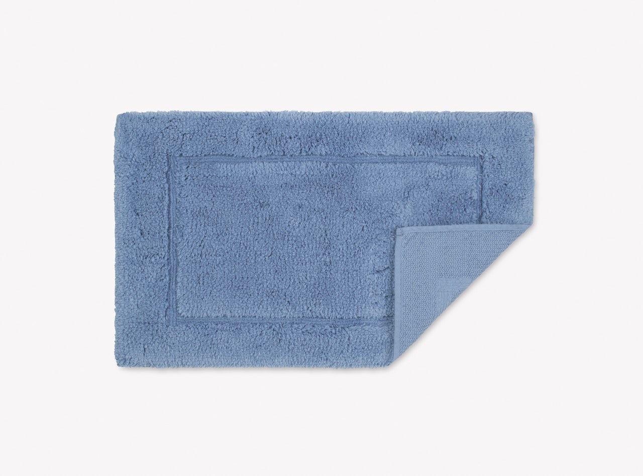 Image of Matouk Milagro small bath rug in color azure.