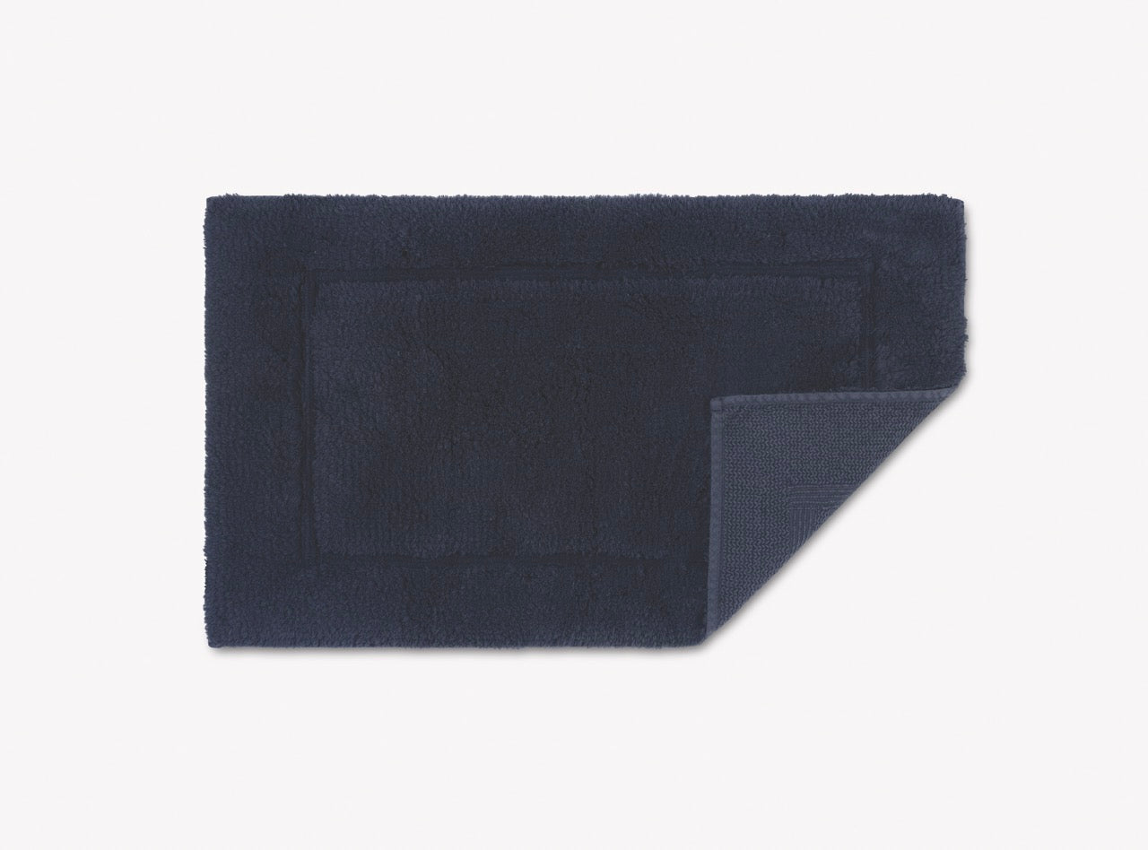 Image of Matouk Milagro small bath rug in color navy.