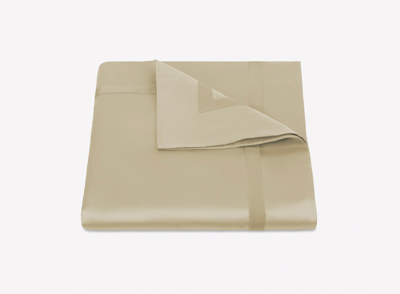 Image of Matouk Nocturne duvet in color champagne.