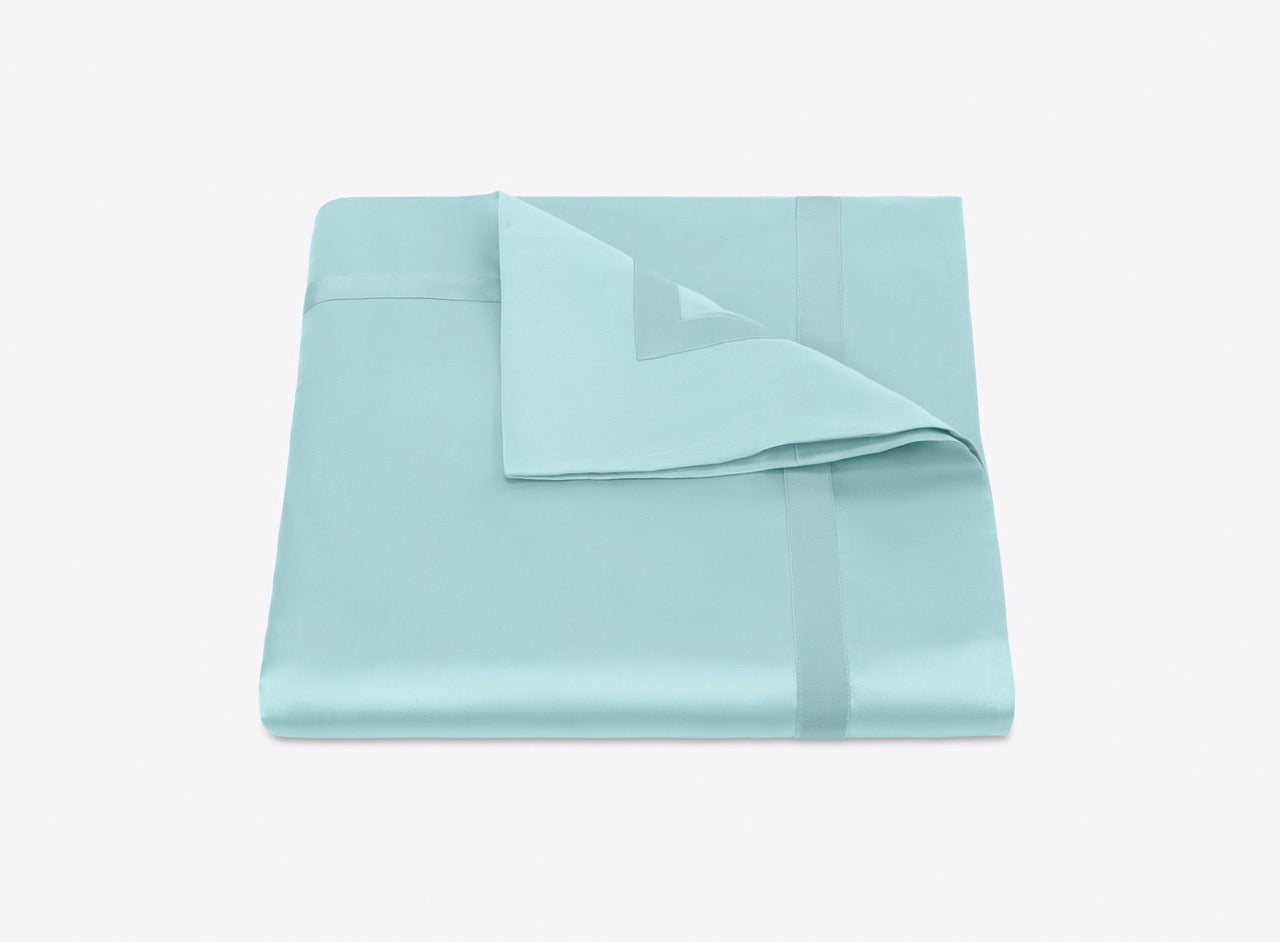 Image of Matouk Nocturne duvet in color lagoon.