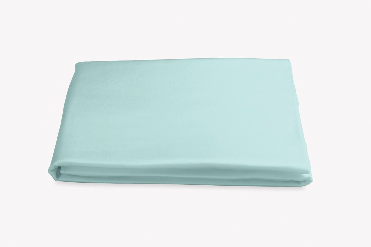 Image of Matouk Nocturne fitted sheet in color lagoon.