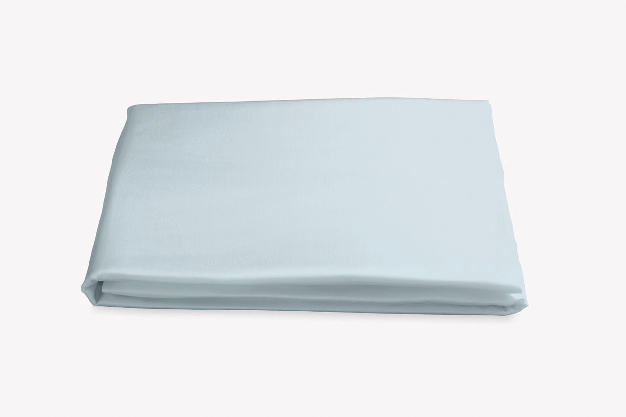 Image of Matouk Nocturne fitted sheet in color pool.