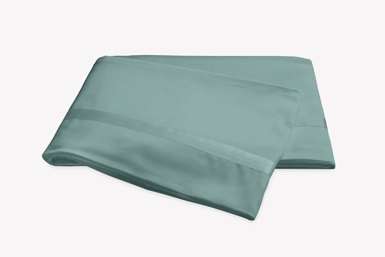 Image of Matouk Nocturne flat sheet in color aquamarine.