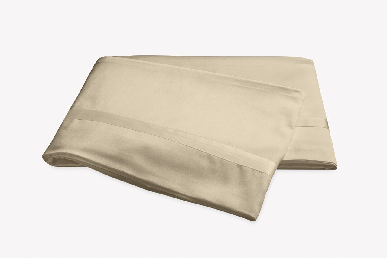 Image of Matouk Nocturne flat sheet in color champagne.