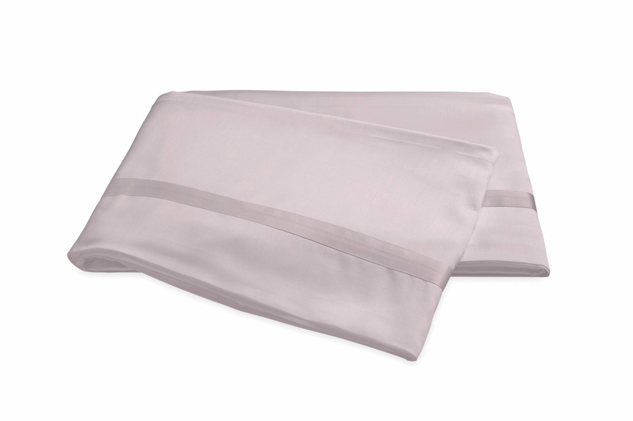 Image of Matouk Nocturne flat sheet in color deep lilac.