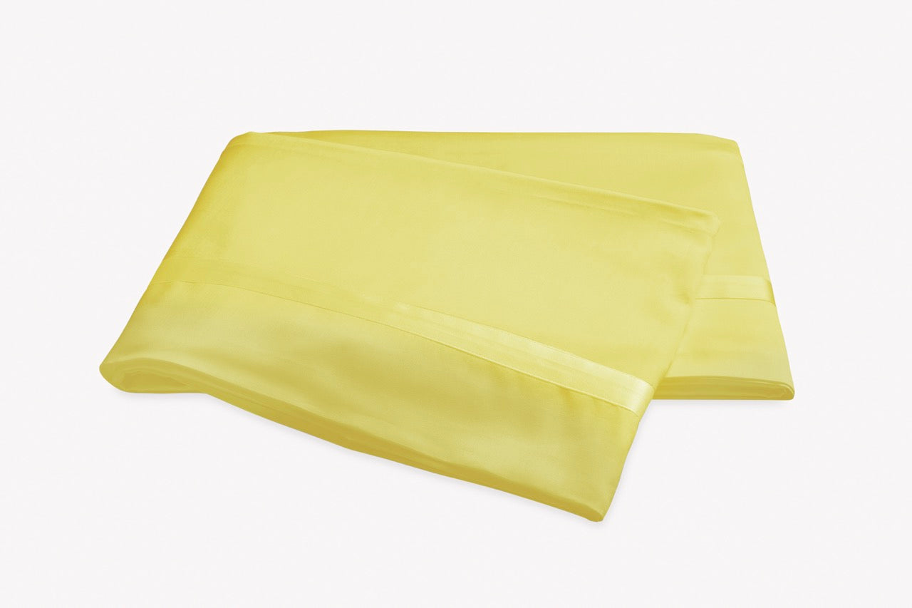 Image of Matouk Nocturne flat sheet in color lemon.