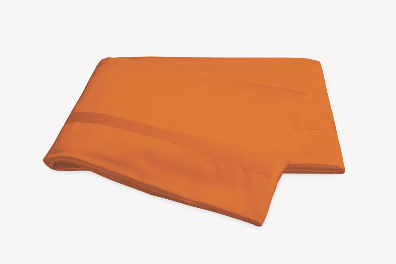 Image of Matouk Nocturne flat sheet in color tangerine.