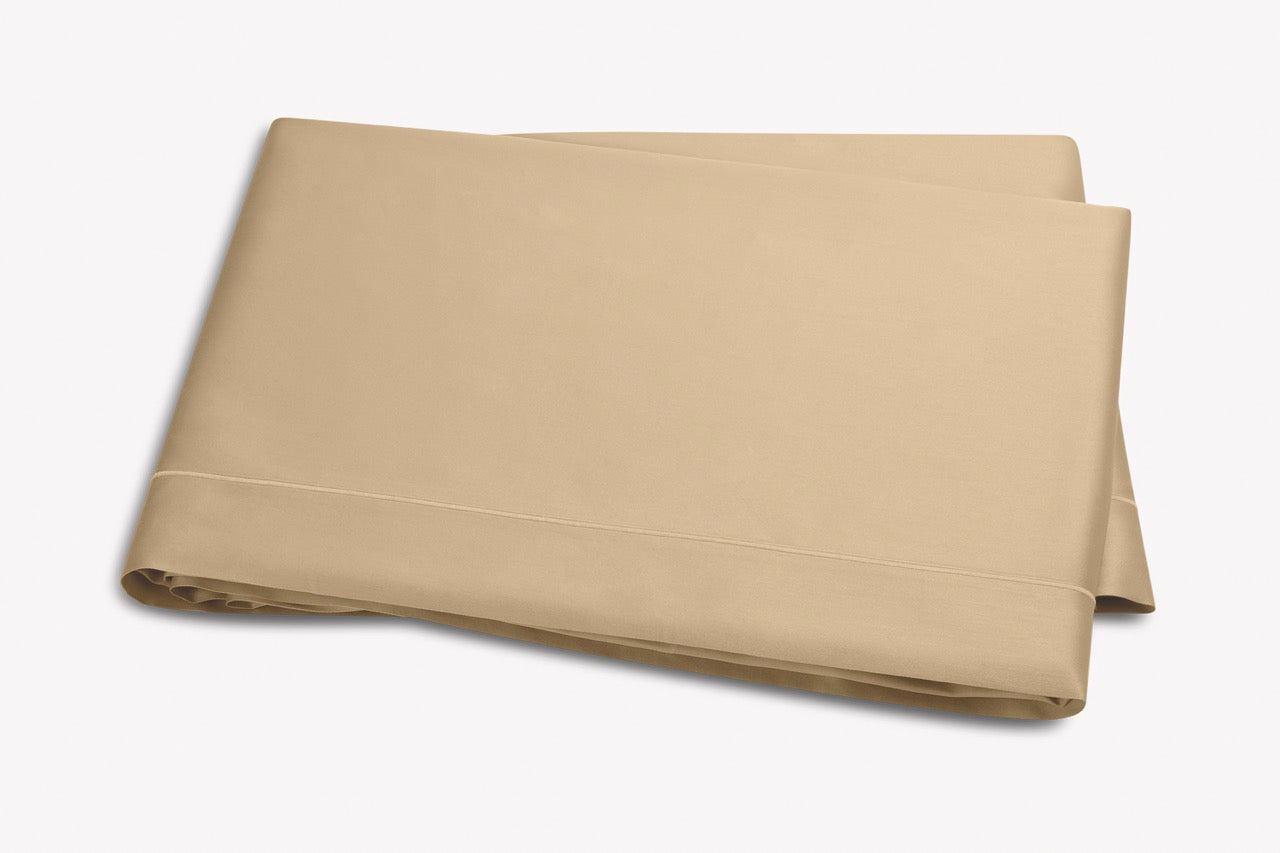 Image of Matouk Talita satin stitch flat sheet in color champagne.