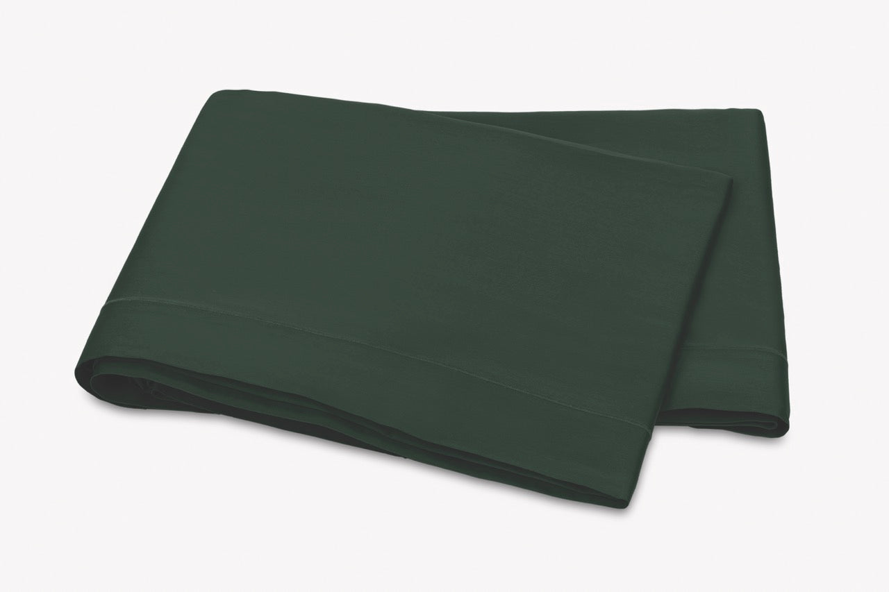 Image of Matouk Talita satin stitch flat sheet in color green.