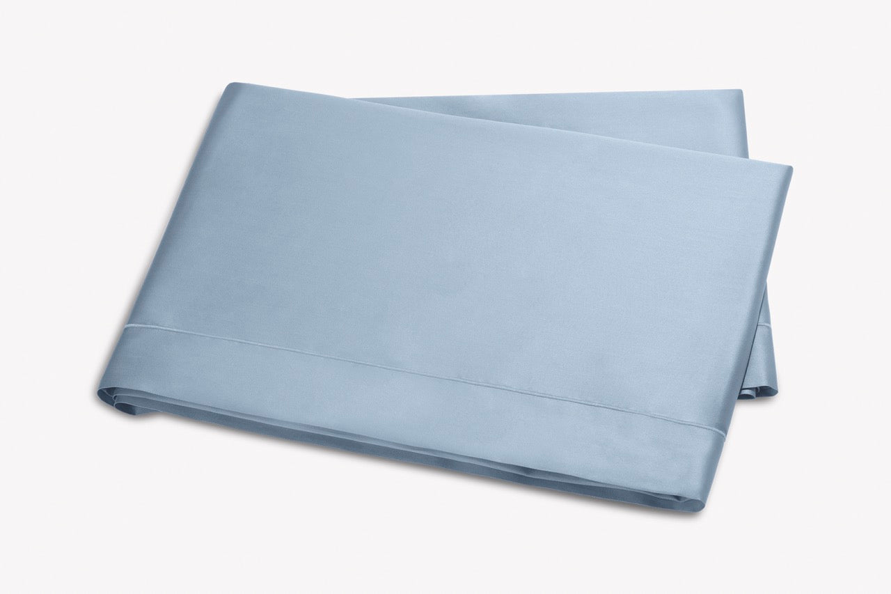 Image of Matouk Talita satin stitch flat sheet in color hazy blue.