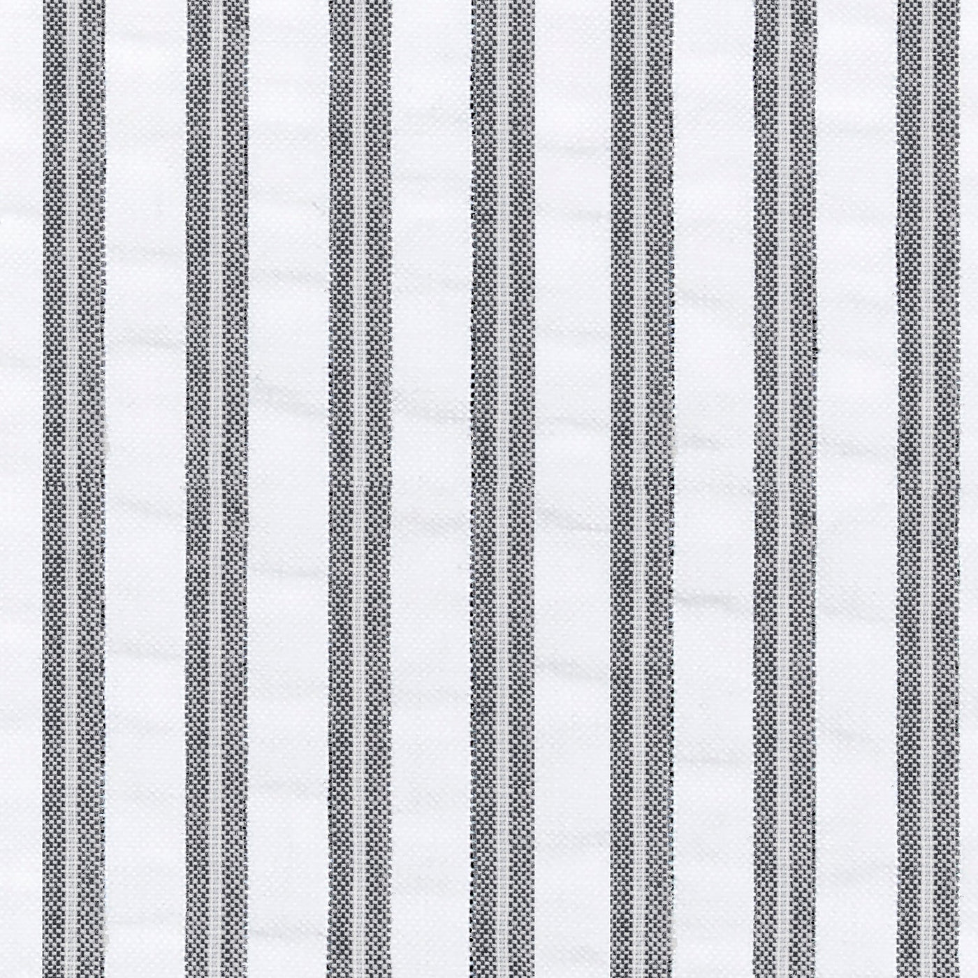 Close-up of charcoal and white woven ticking stripe fabric texture.